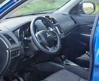 Interni di Mitsubishi Outlander Sport in affitto in Georgia. Un'ottima auto da 5 posti con cambio Automatico.