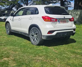 Mitsubishi Outlander Sport 2019 disponibile per il noleggio a Tbilisi, con limite di chilometraggio di illimitato.