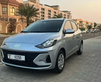 Vista frontale di un noleggio Hyundai Grand i10 Nios a Dubai, Emirati Arabi Uniti ✓ Auto #10148. ✓ Cambio Automatico TM ✓ 0 recensioni.