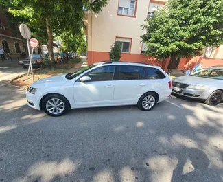 Vista frontale di un noleggio Skoda Octavia Combi a Podgorica, Montenegro ✓ Auto #9027. ✓ Cambio Automatico TM ✓ 0 recensioni.