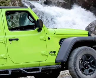 Jeep Wrangler Sahara 2021 disponibile per il noleggio a Tbilisi, con limite di chilometraggio di 250 km/giorno.