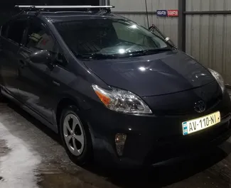 Noleggio auto Toyota Prius 2014 in Georgia, con carburante Ibrido e 185 cavalli di potenza ➤ A partire da 90 GEL al giorno.