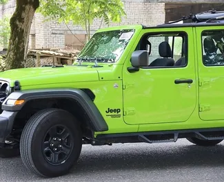 Noleggio Jeep Wrangler Sahara. Auto Comfort, SUV, Cabrio per il noleggio in Georgia ✓ Cauzione di Deposito di 850 GEL ✓ Opzioni assicurative RCT, FDW, Passeggeri, Furto.