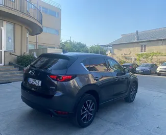 Noleggio Mazda CX-5. Auto Economica, Comfort, Crossover per il noleggio in Georgia ✓ Cauzione di Senza deposito ✓ Opzioni assicurative RCT, FDW, All'estero.