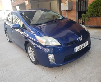 Noleggio auto Toyota Prius 2011 in Georgia, con carburante Ibrido e 120 cavalli di potenza ➤ A partire da 62 GEL al giorno.