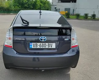 Noleggio auto Toyota Prius 2010 in Georgia, con carburante Ibrido e 120 cavalli di potenza ➤ A partire da 62 GEL al giorno.