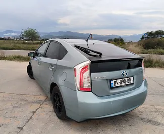 Noleggio auto Toyota Prius 2013 in Georgia, con carburante Ibrido e 136 cavalli di potenza ➤ A partire da 65 GEL al giorno.