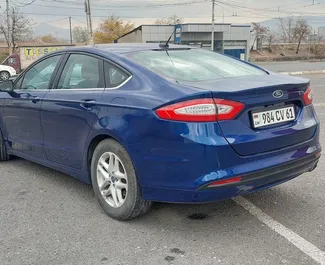 Noleggio Ford Fusion Sedan. Auto Comfort, Premium per il noleggio in Armenia ✓ Cauzione di Deposito di 250 USD ✓ Opzioni assicurative RCT, CDW, All'estero, Giovane.