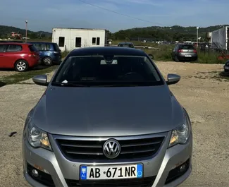 Vista frontale di un noleggio Volkswagen Passat-CC all'aeroporto di Tirana, Albania ✓ Auto #10308. ✓ Cambio Automatico TM ✓ 0 recensioni.