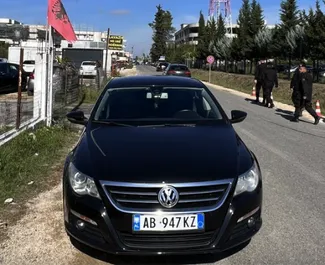 Vista frontale di un noleggio Volkswagen Passat-CC all'aeroporto di Tirana, Albania ✓ Auto #10306. ✓ Cambio Automatico TM ✓ 0 recensioni.