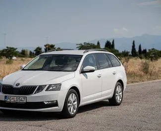 Vista frontale di un noleggio Skoda Octavia Combi a Podgorica, Montenegro ✓ Auto #6701. ✓ Cambio Automatico TM ✓ 2 recensioni.