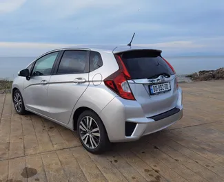 Noleggio auto Honda Fit 2015 in Georgia, con carburante Benzina e 130 cavalli di potenza ➤ A partire da 94 GEL al giorno.