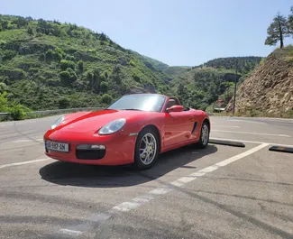 Vista frontale di un noleggio Porsche Boxster a Tbilisi, Georgia ✓ Auto #10526. ✓ Cambio Automatico TM ✓ 0 recensioni.