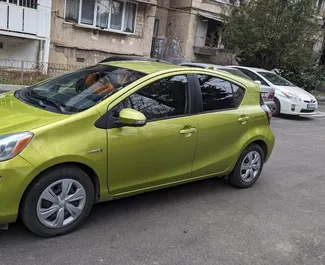 Noleggio auto Toyota Prius C 2015 in Georgia, con carburante Benzina e 120 cavalli di potenza ➤ A partire da 80 GEL al giorno.