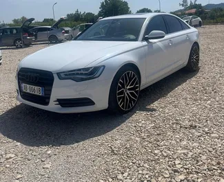 Vista frontale di un noleggio Audi A6 all'aeroporto di Tirana, Albania ✓ Auto #10515. ✓ Cambio Automatico TM ✓ 0 recensioni.