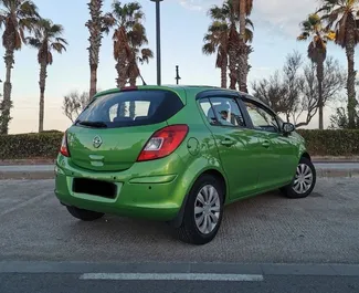 Noleggio auto Opel Corsa 2012 in Spagna, con carburante Benzina e 90 cavalli di potenza ➤ A partire da 30 EUR al giorno.