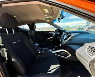 Noleggio Hyundai Veloster. Auto Comfort per il noleggio in Georgia ✓ Cauzione di Senza deposito ✓ Opzioni assicurative RCT, CDW, FDW, Passeggeri, Furto.