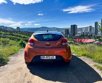 Noleggio auto Hyundai Veloster 2014 in Georgia, con carburante Benzina e 136 cavalli di potenza ➤ A partire da 116 GEL al giorno.