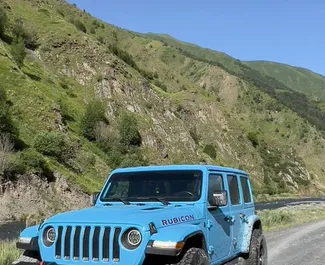 Noleggio Jeep Wrangler Rubicon. Auto Comfort, Premium, SUV per il noleggio in Georgia ✓ Cauzione di Deposito di 1000 GEL ✓ Opzioni assicurative RCT, CDW, Passeggeri, Furto.