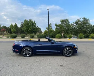 Noleggio Ford Mustang Cabrio. Auto Premium, Lusso, Cabrio per il noleggio in Georgia ✓ Cauzione di Deposito di 800 GEL ✓ Opzioni assicurative RCT, CDW, SCDW, Passeggeri, Furto.