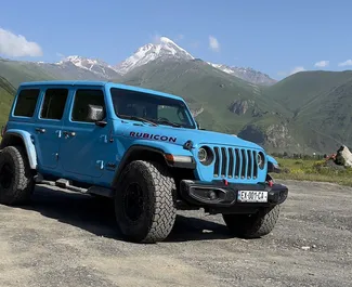 Jeep Wrangler Rubicon 2021 disponibile per il noleggio a Tbilisi, con limite di chilometraggio di 250 km/giorno.