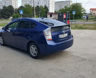 Noleggio auto Toyota Prius 2014 in Georgia, con carburante Ibrido e 160 cavalli di potenza ➤ A partire da 72 GEL al giorno.