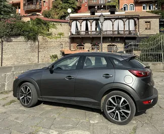 Noleggio auto Mazda CX-3 2018 in Georgia, con carburante Benzina e 150 cavalli di potenza ➤ A partire da 120 GEL al giorno.