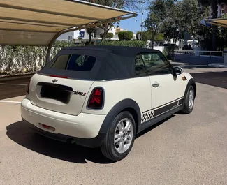 Noleggio auto Mini Cooper Cabrio 2013 in Spagna, con carburante Benzina e 98 cavalli di potenza ➤ A partire da 45 EUR al giorno.