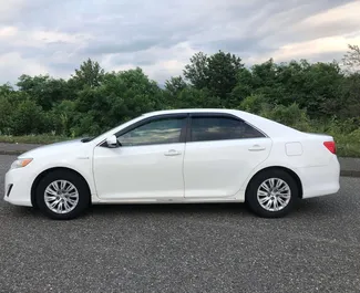 Noleggio auto Toyota Camry 2012 in Georgia, con carburante Ibrido e 181 cavalli di potenza ➤ A partire da 80 GEL al giorno.