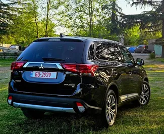 Noleggio Mitsubishi Outlander. Auto Comfort, Crossover per il noleggio in Georgia ✓ Cauzione di Senza deposito ✓ Opzioni assicurative RCT, Passeggeri, Furto, Giovane.