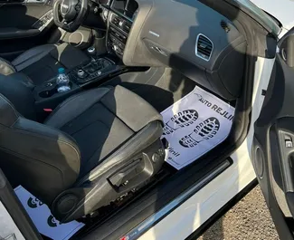 Audi A5 Cabrio 2016 disponibile per il noleggio all'aeroporto di Tirana, con limite di chilometraggio di illimitato.