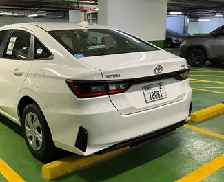 Noleggio auto Toyota Yaris Ativ 2023 negli Emirati Arabi Uniti, con carburante Benzina e 110 cavalli di potenza ➤ A partire da 125 AED al giorno.
