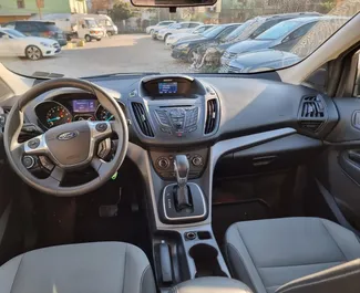 Ford Kuga 2013 disponibile per il noleggio a Tirana, con limite di chilometraggio di illimitato.