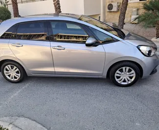 Noleggio auto Honda Fit 2022 a Cipro, con carburante Benzina e 95 cavalli di potenza ➤ A partire da 23 EUR al giorno.