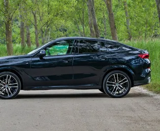 Vista frontale di un noleggio BMW X6 in Becici, Montenegro ✓ Auto #12168. ✓ Cambio Automatico TM ✓ 0 recensioni.
