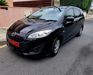 Vista frontale di un noleggio Mazda Premacy a Limassol, Cipro ✓ Auto #6681. ✓ Cambio Automatico TM ✓ 0 recensioni.