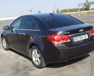 Noleggio Chevrolet Cruze. Auto Comfort per il noleggio in Georgia ✓ Cauzione di Deposito di 300 GEL ✓ Opzioni assicurative RCT, SCDW, FDW, Passeggeri, Giovane.