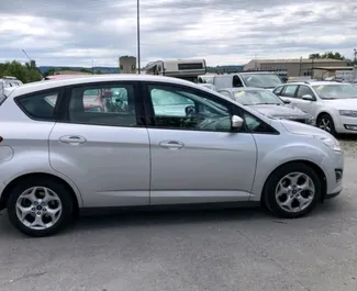 Noleggio Ford C-Max. Auto Comfort, Monovolume per il noleggio in Albania ✓ Cauzione di Deposito di 100 EUR ✓ Opzioni assicurative RCT, FDW, Giovane.