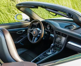Noleggio Porsche 911 Carrera S Cabrio. Auto Premium, Lusso, Cabrio per il noleggio in Montenegro ✓ Cauzione di Deposito di 5000 EUR ✓ Opzioni assicurative RCT, Passeggeri, Furto.