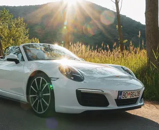 Porsche 911 Carrera S Cabrio 2014 disponibile per il noleggio in Becici, con limite di chilometraggio di illimitato.