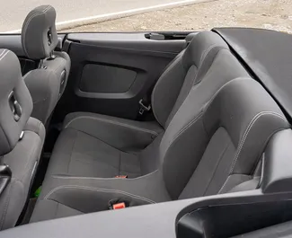 Noleggio Ford Mustang Cabrio. Auto Premium, Lusso, Cabrio per il noleggio in Georgia ✓ Cauzione di Deposito di 560 GEL ✓ Opzioni assicurative RCT, CDW, SCDW, FDW, Passeggeri, Furto.