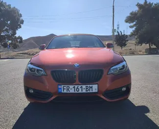 Vista frontale di un noleggio BMW 230xi Cabrio a Tbilisi, Georgia ✓ Auto #12308. ✓ Cambio Automatico TM ✓ 0 recensioni.