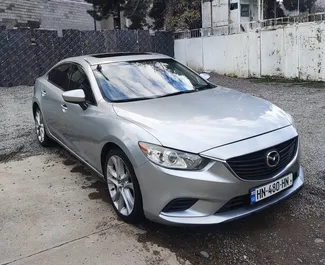 Vista frontale di un noleggio Mazda 6 a Tbilisi, Georgia ✓ Auto #12499. ✓ Cambio Automatico TM ✓ 0 recensioni.