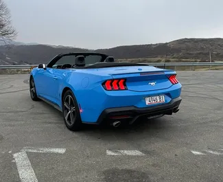 Noleggio auto Ford Mustang Cabrio 2024 in Georgia, con carburante Benzina e 325 cavalli di potenza ➤ A partire da 335 GEL al giorno.