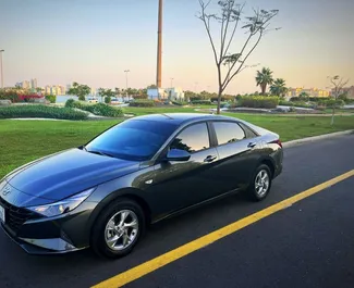 Noleggio Hyundai Elantra. Auto Comfort, Premium per il noleggio negli Emirati Arabi Uniti ✓ Cauzione di Deposito di 2000 AED ✓ Opzioni assicurative RCT, CDW.
