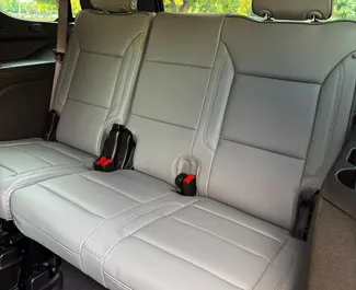 Noleggio auto GMC Yukon 2025 negli Emirati Arabi Uniti, con carburante Benzina e 355 cavalli di potenza ➤ A partire da 550 AED al giorno.
