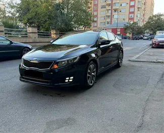 Vista frontale di un noleggio Kia Optima a Baku, Azerbaigian ✓ Auto #12938. ✓ Cambio Automatico TM ✓ 0 recensioni.