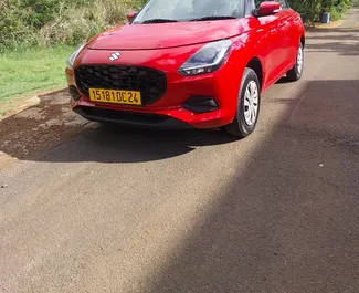 Vista frontale di un noleggio Suzuki Swift a Mauritius, Mauritius ✓ Auto #13070. ✓ Cambio Automatico TM ✓ 0 recensioni.