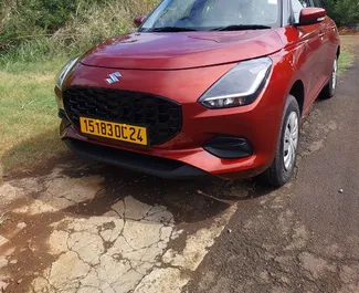 Vista frontale di un noleggio Suzuki Swift a Mauritius, Mauritius ✓ Auto #13069. ✓ Cambio Automatico TM ✓ 0 recensioni.