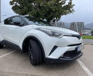 Noleggio auto Toyota C-HR 2019 in Montenegro, con carburante Ibrido e 98 cavalli di potenza ➤ A partire da 30 EUR al giorno.